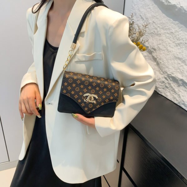 7A2174D4-83D8-440A-8FF7-9B6418E7E531.jpeg Kassy bag